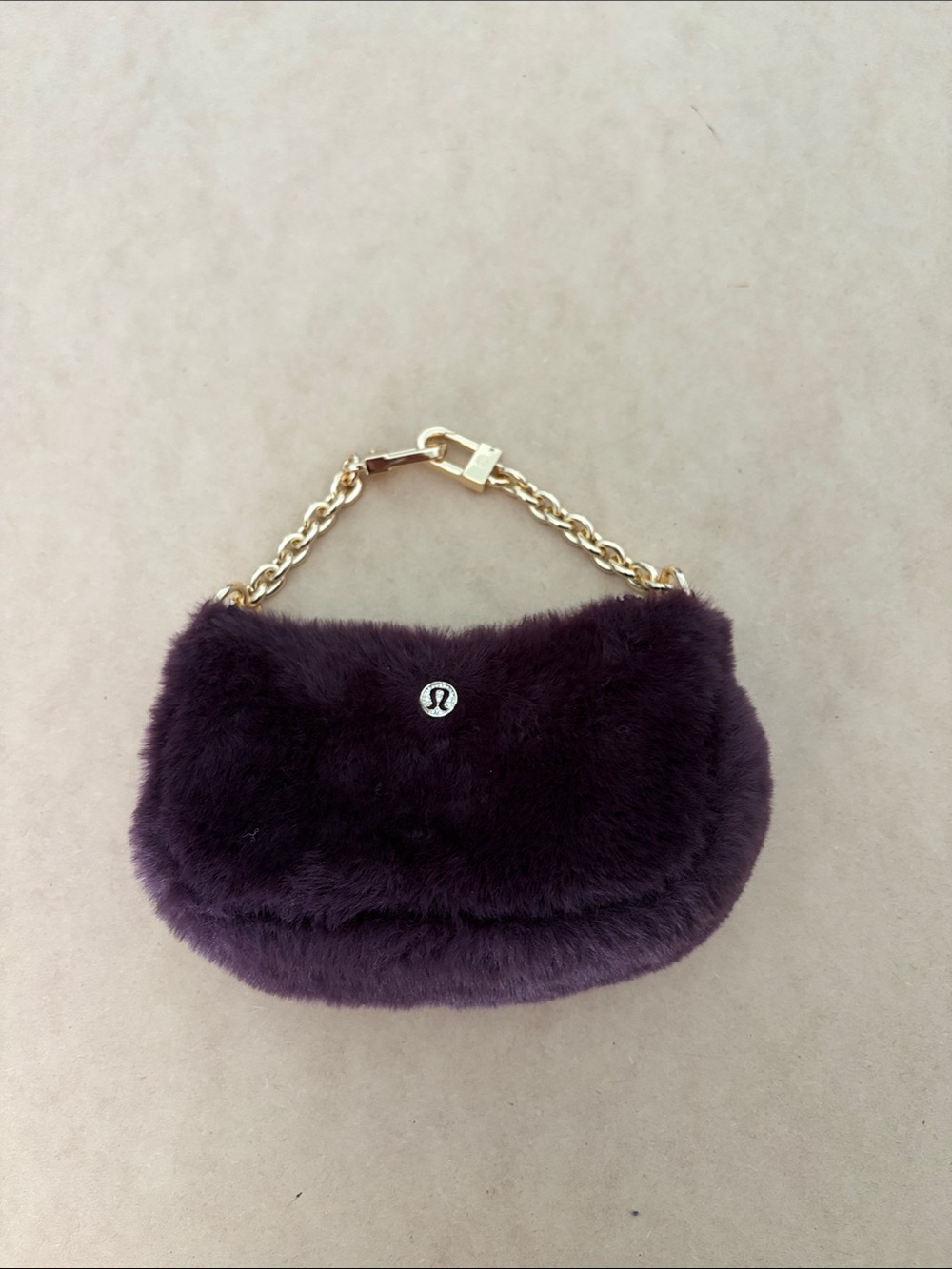 lululemon athletica Plush Faux Fur Mini Bag in Plum with Gold Chain